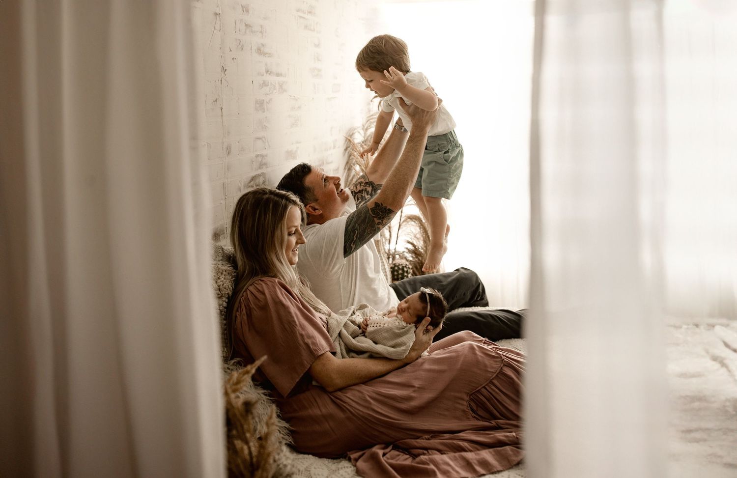 A cozy indoor family portrait
