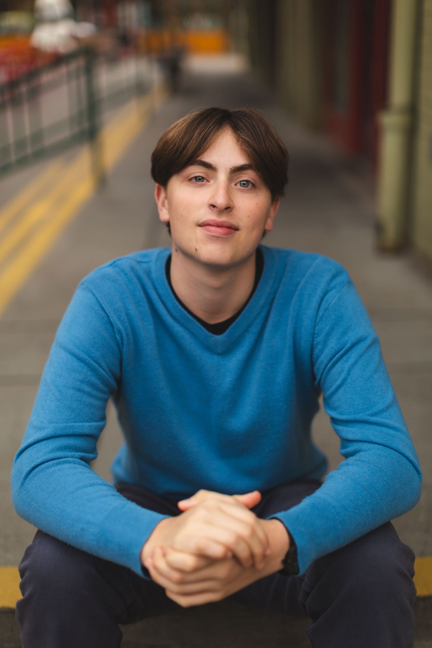 Senior portrait wearing a vintage blue sweater