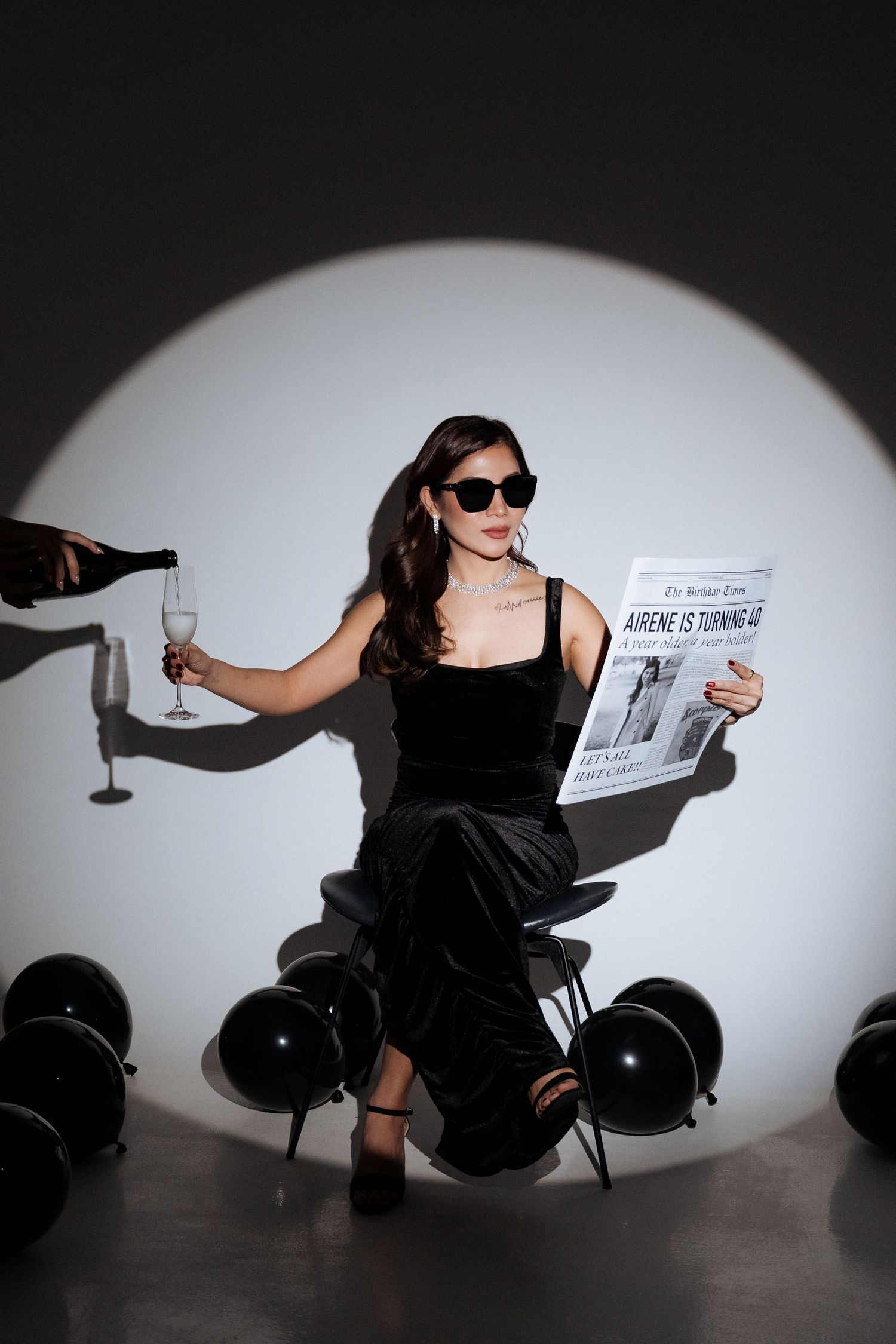 Creative studio portrait in Dubai with dramatic spotlight lighting