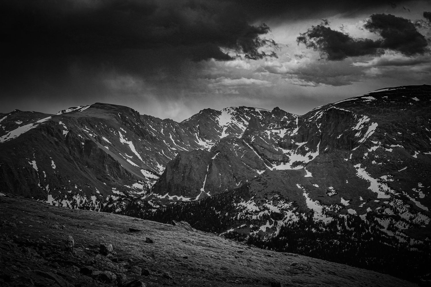 Black and white storm over the rocky mountains