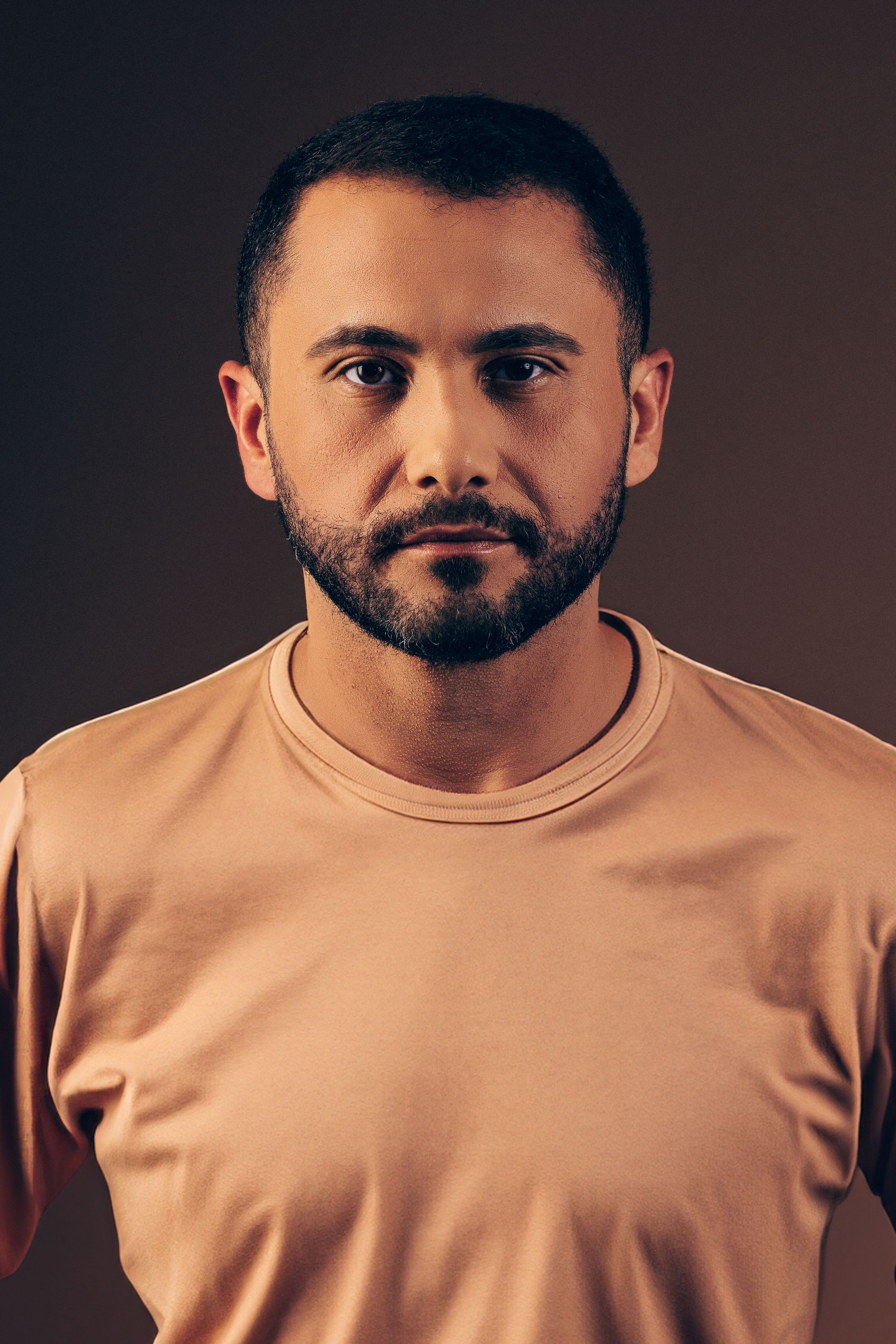 A series of cropped photos showing a person in a beige t-shirt against a dark background.