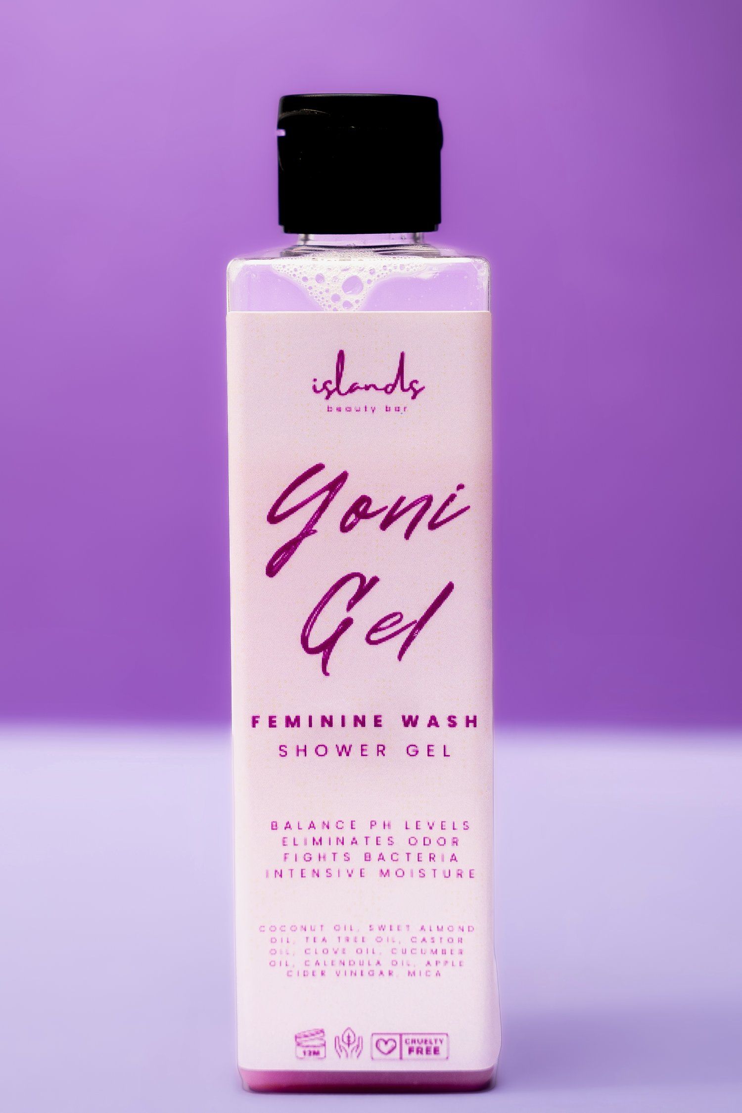 Islands Beauty Bar Yoni Gel feminine wash bottle against purple background.