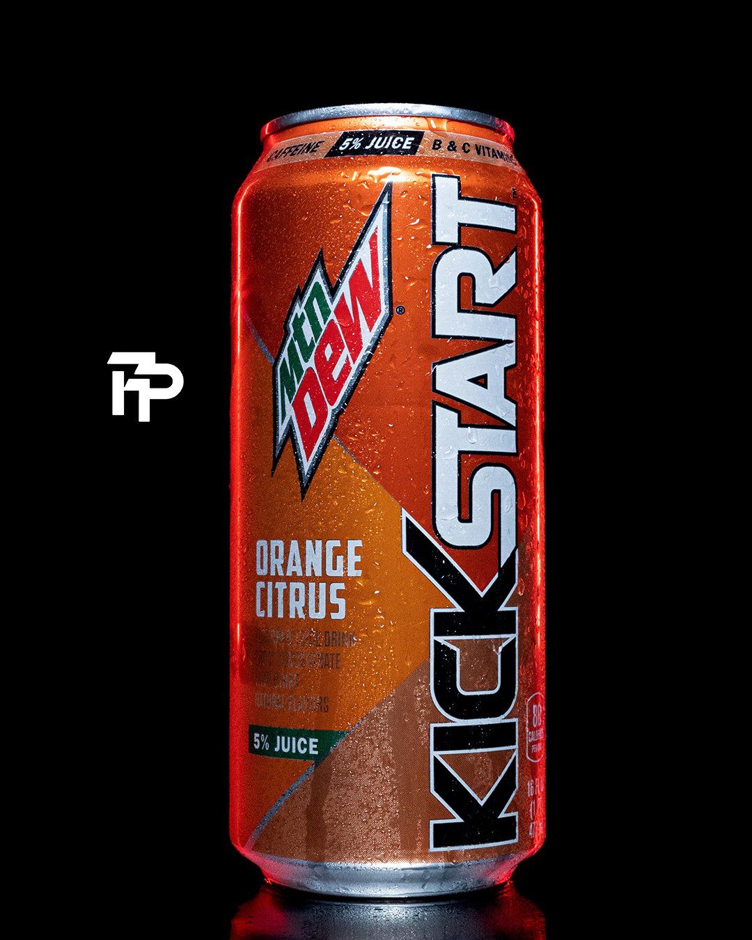 Mountain Dew Kickstart Orange Citrus energy drink can on black background.