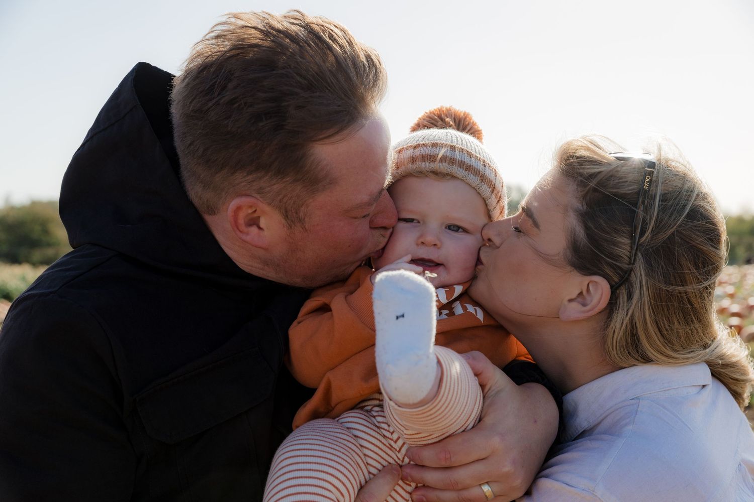 A tender family embrace captured during a bright autumn day outdoors.  Photographer. Hull. East Yorkshire. Photography