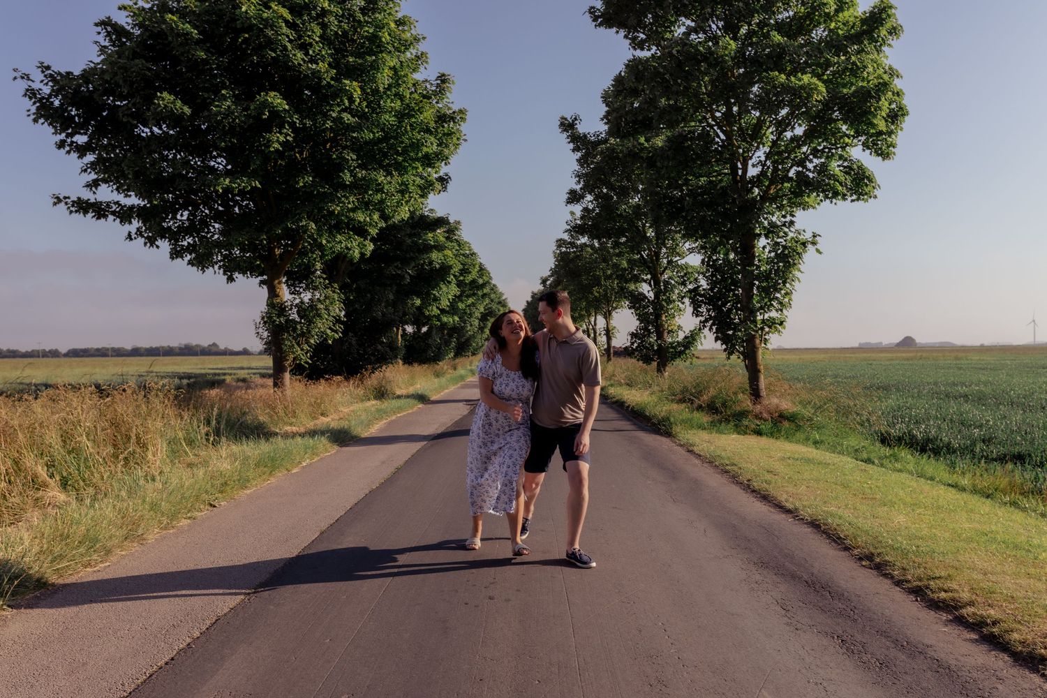 Tree-lined country road stretching into the distance on a sunny summer day. Photographer. Hull. East Yorkshire. Photography
