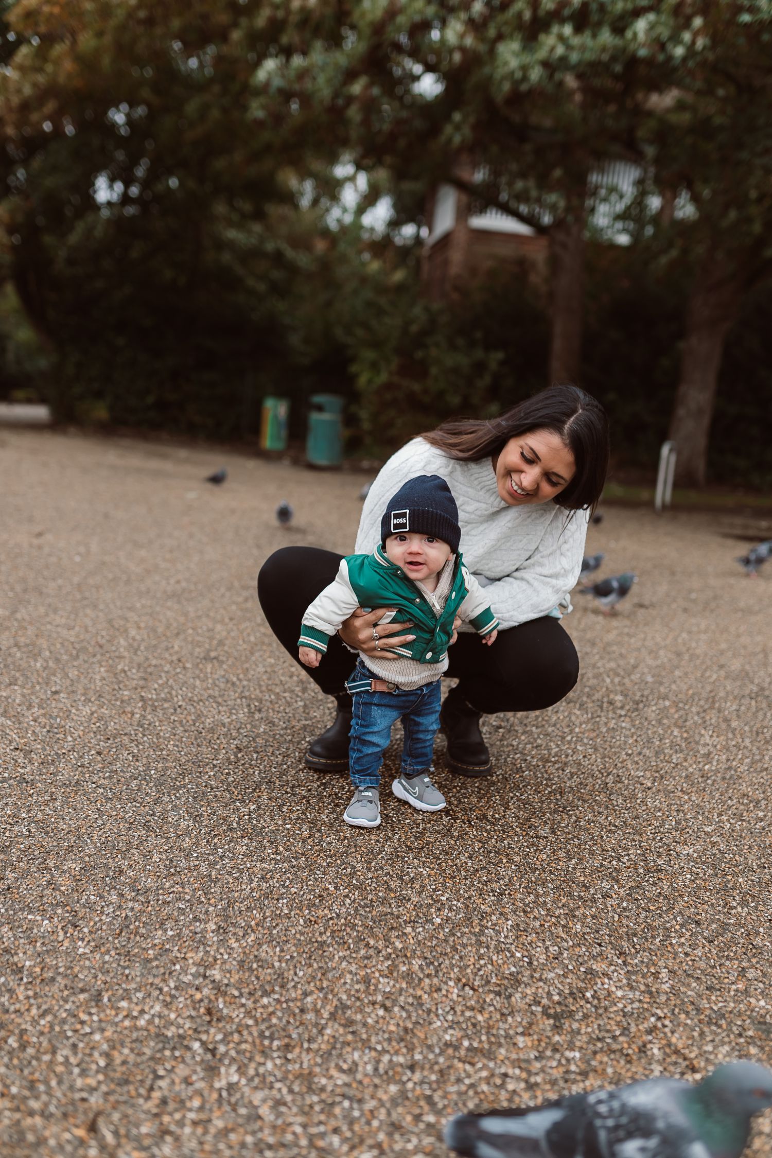 A playful moment captured on gravel ground with a teal and gray outfit on an autumn day. Photographer. Hull. East Yorkshire. Photography
