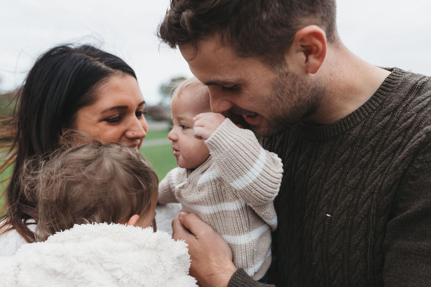 Intimate family moment captured during an outdoor photoshoot on a cloudy day. Photographer. Hull. East Yorkshire. Photography