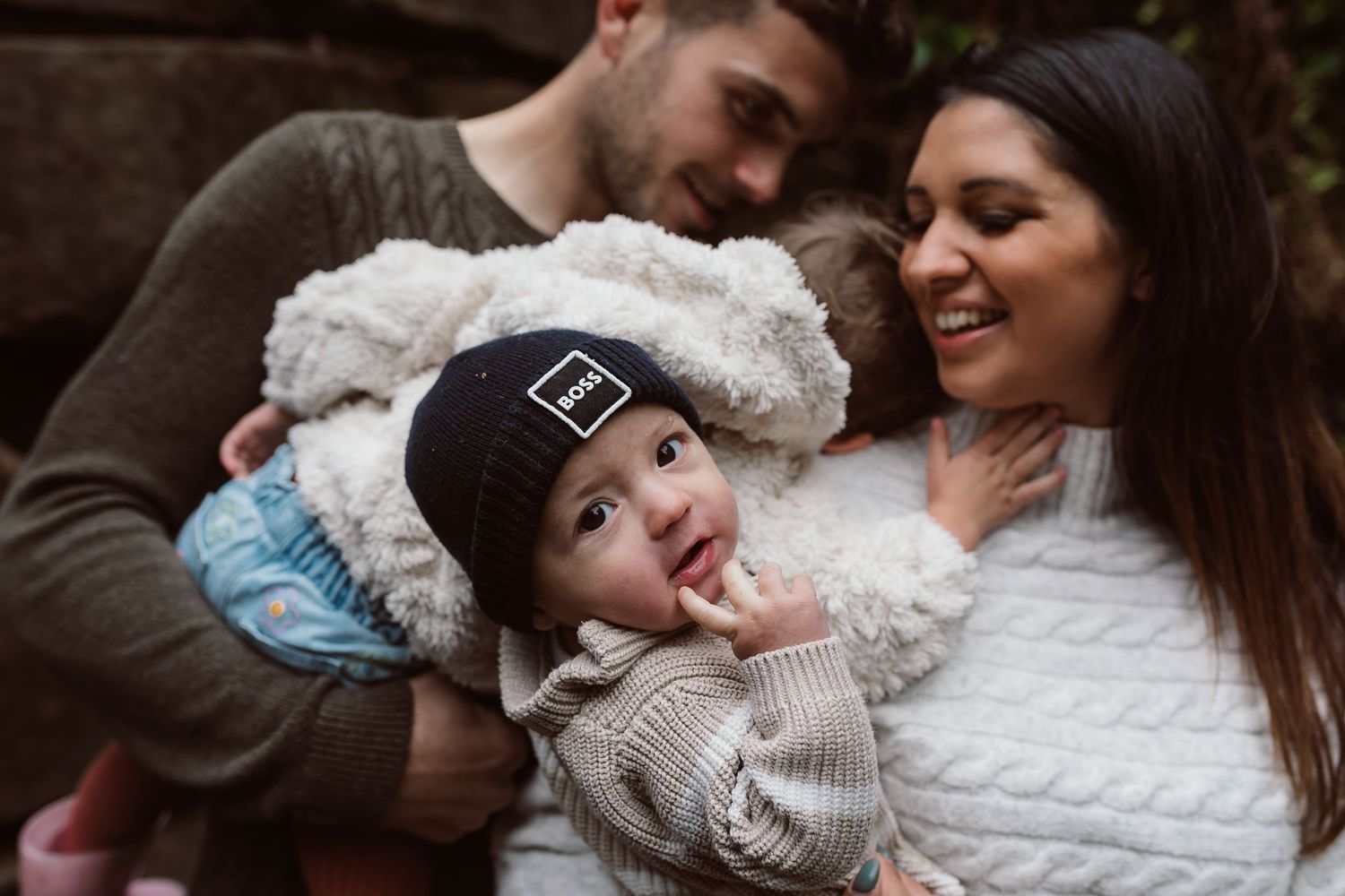 Candid family moments captured while wearing cozy knit sweaters during a fall photo session. Photographer. Hull. East Yorkshire. Photography