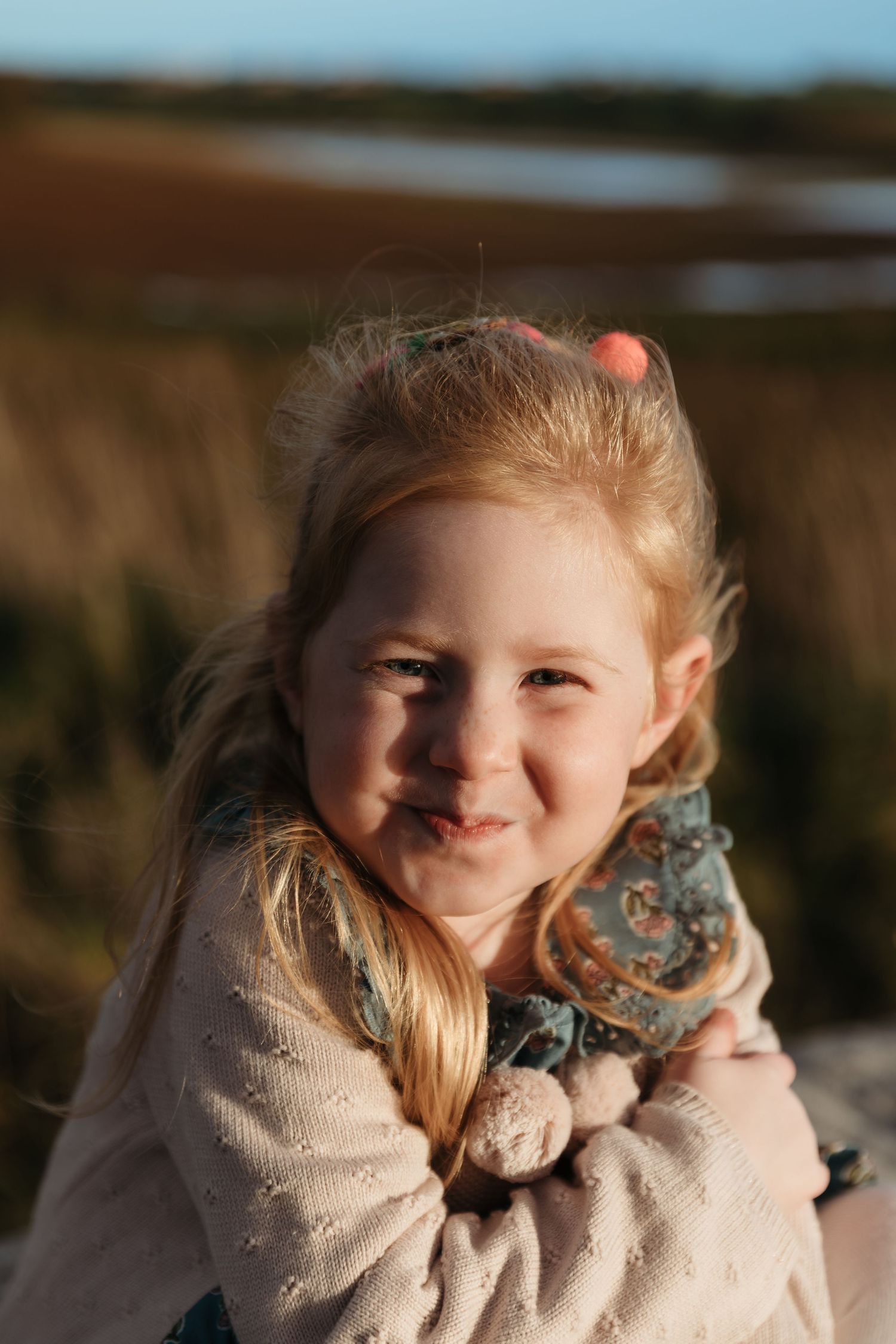 A cozy autumn portrait captured in warm sunlight against a natural outdoor backdrop. Photographer. Hull. East Yorkshire. Photography