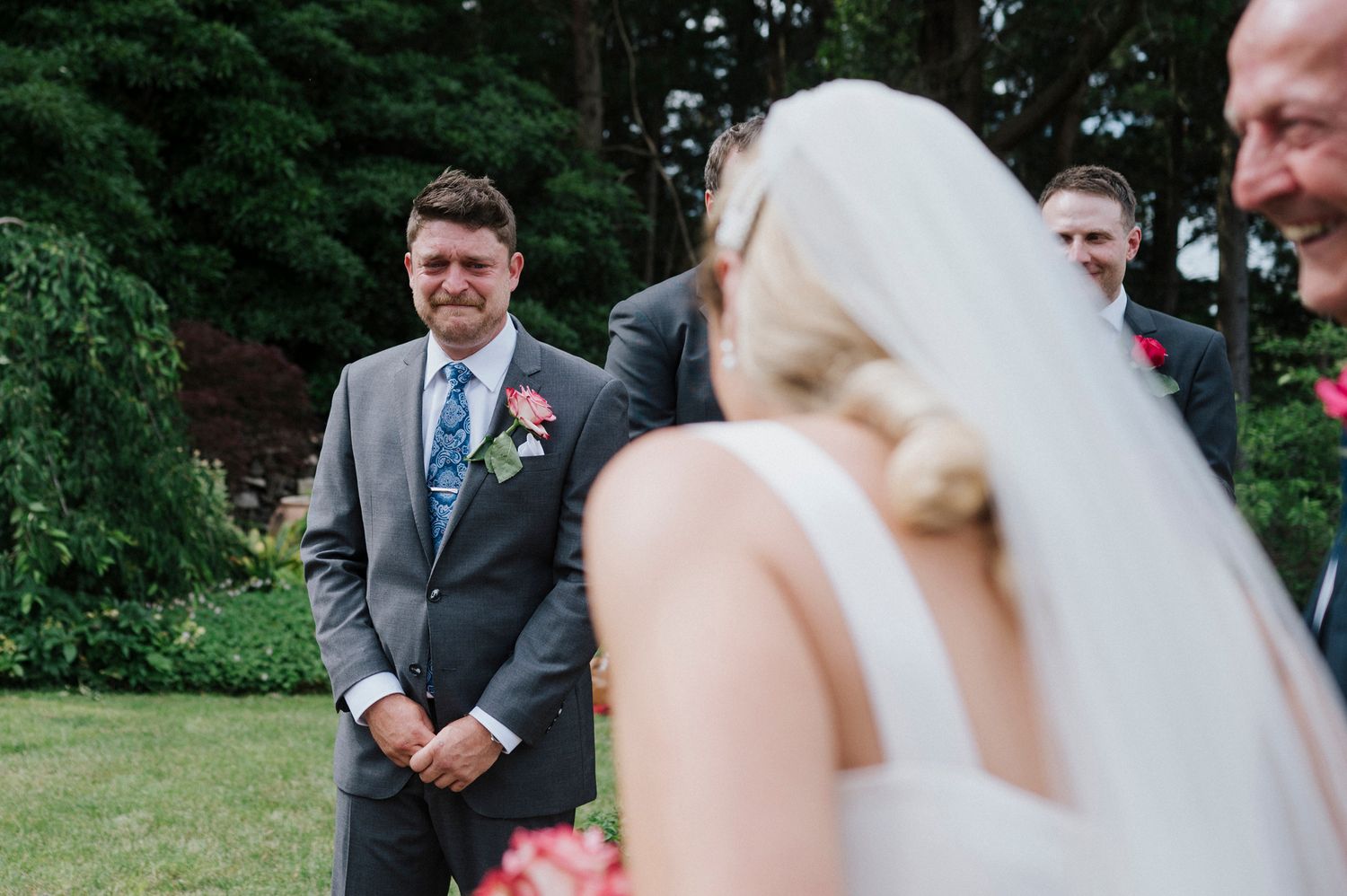A multi-panel sequence of wedding photos showing joyful candid moments between a bride and groom in an outdoor garden setting.