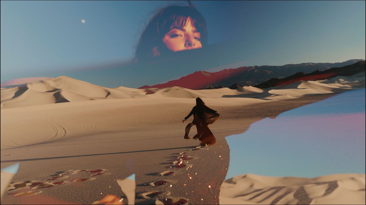 Figure surfing down a sand dune in a desert landscape during sunset with ethereal reflections and light effects.