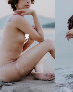 Minimalist seaside portrait with soft natural lighting.