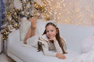 Dreamy winter scene with twinkling lights and white decor.