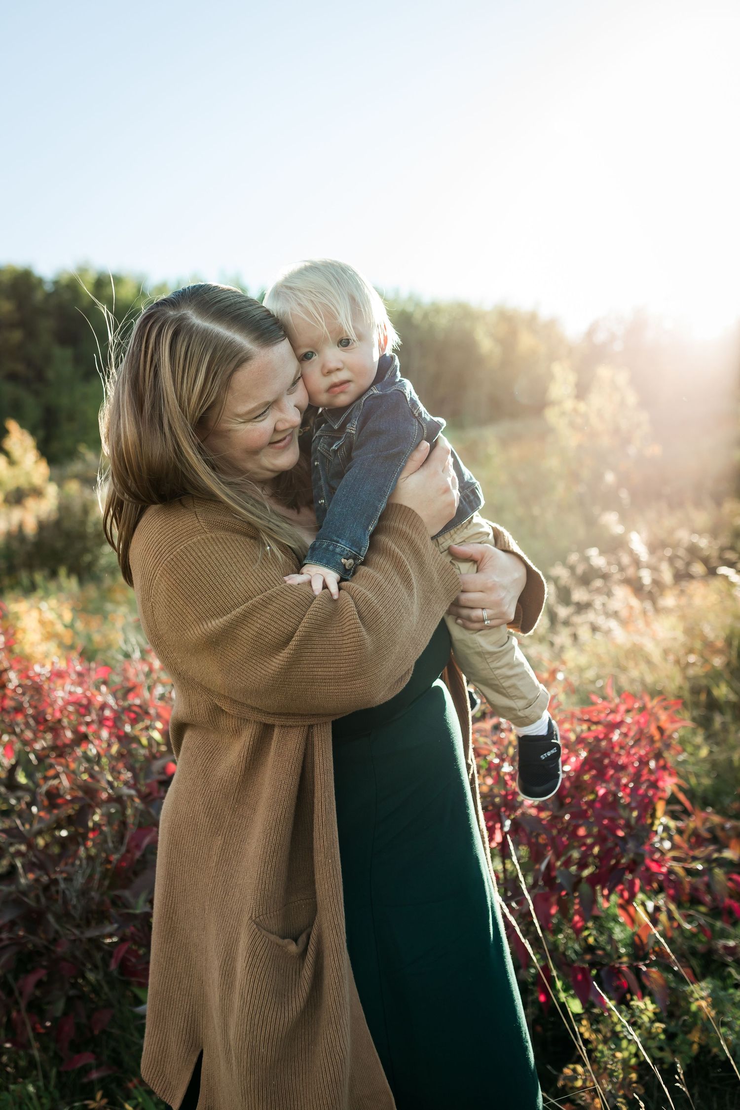 Fall mini sessions at Nose Hill Park during golden hour by lifestyle family photographer, Love & Sunshine Photography.