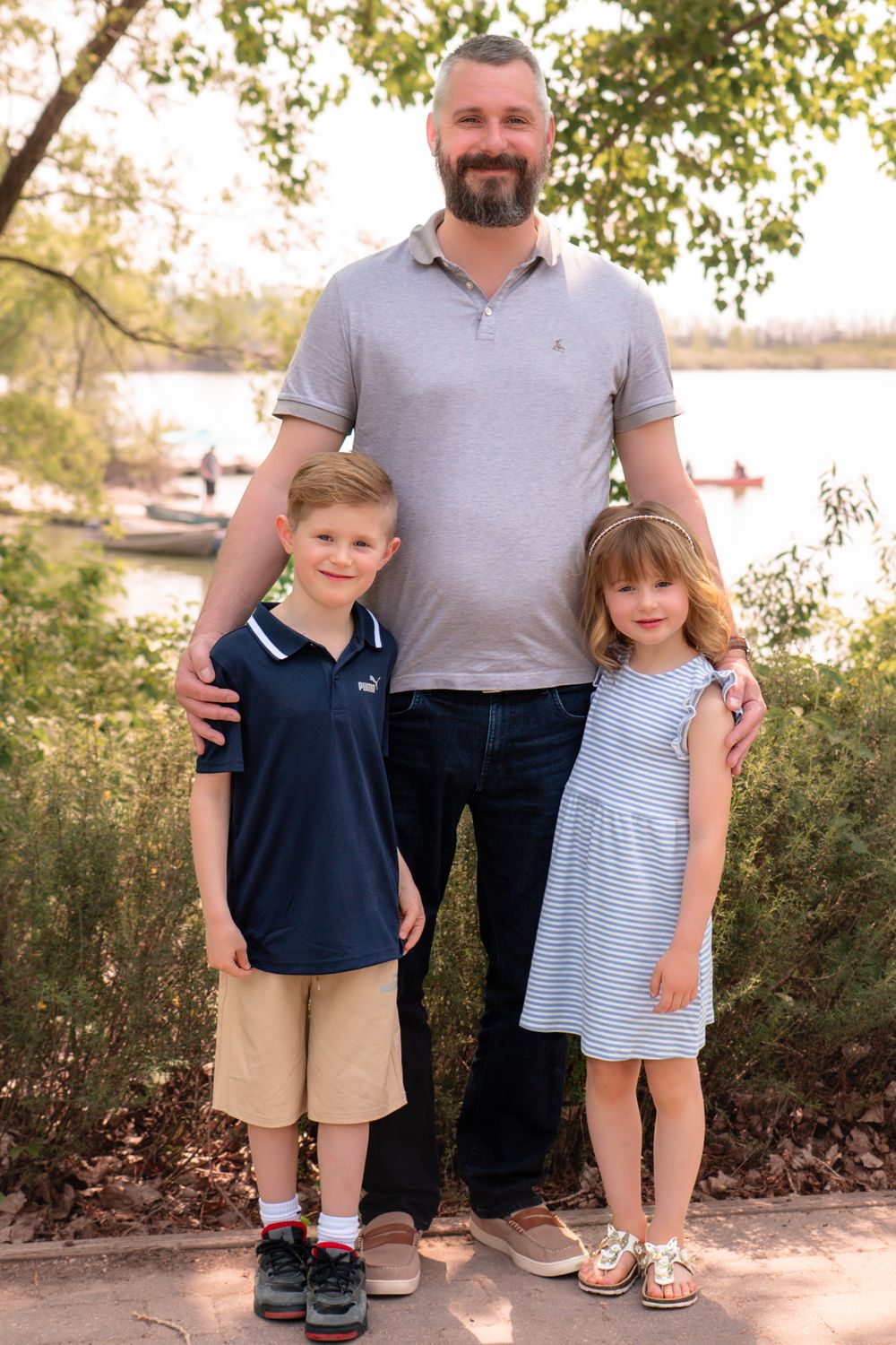 Three similar photos of children standing with an adult, taken outdoors on a sunny day near a lake.