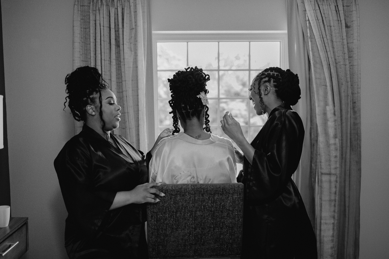 Wedding photographer and videographer at work in a Fort Worth venue, capturing timeless moments