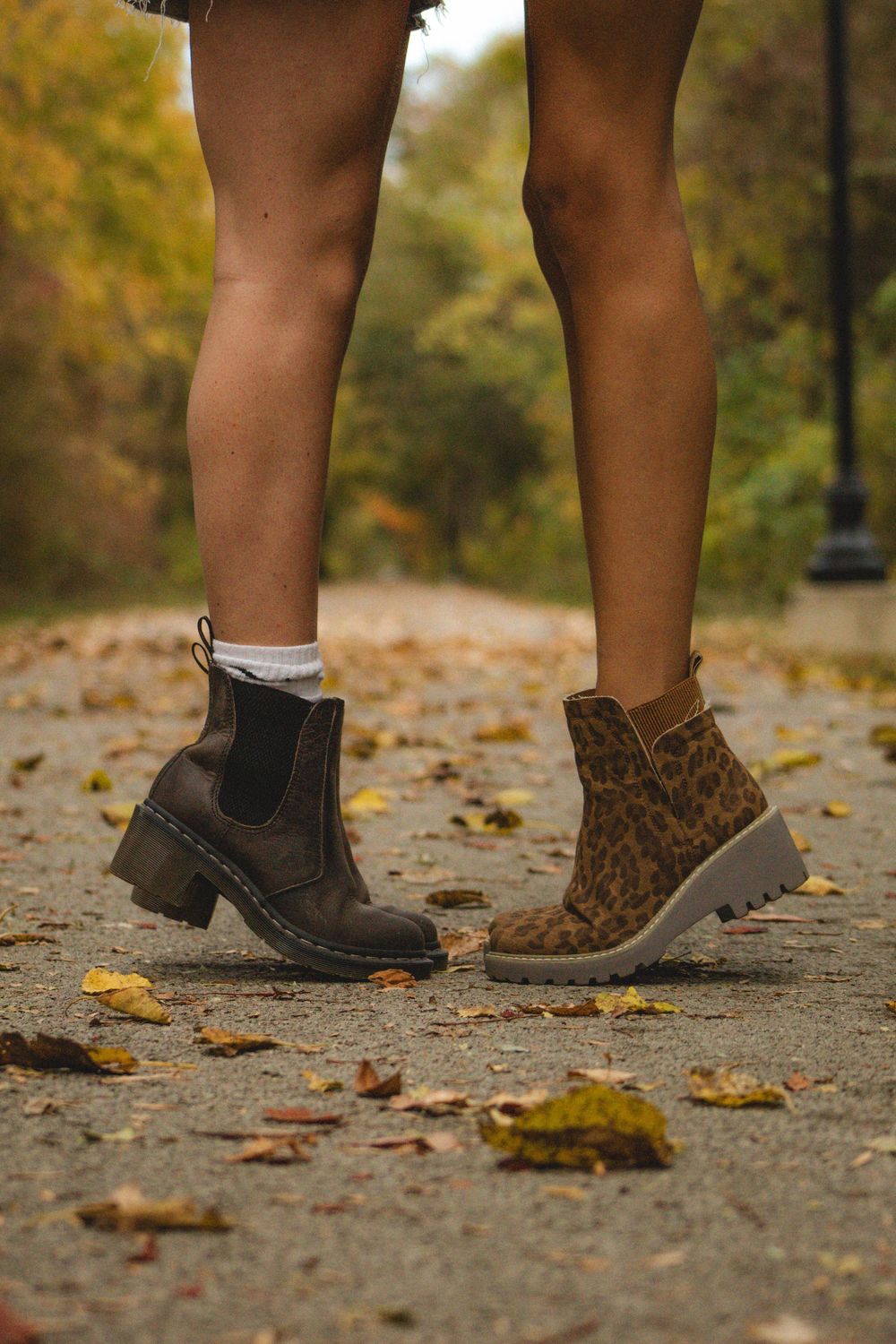 two friends showing off their cute boots