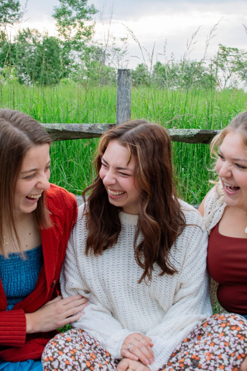 three friends laughing among each other