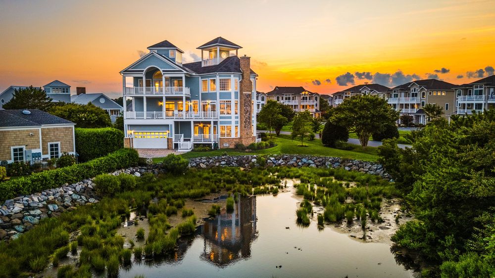 Twilight aerial photography of a luxury home in West Ocean City Maryland.