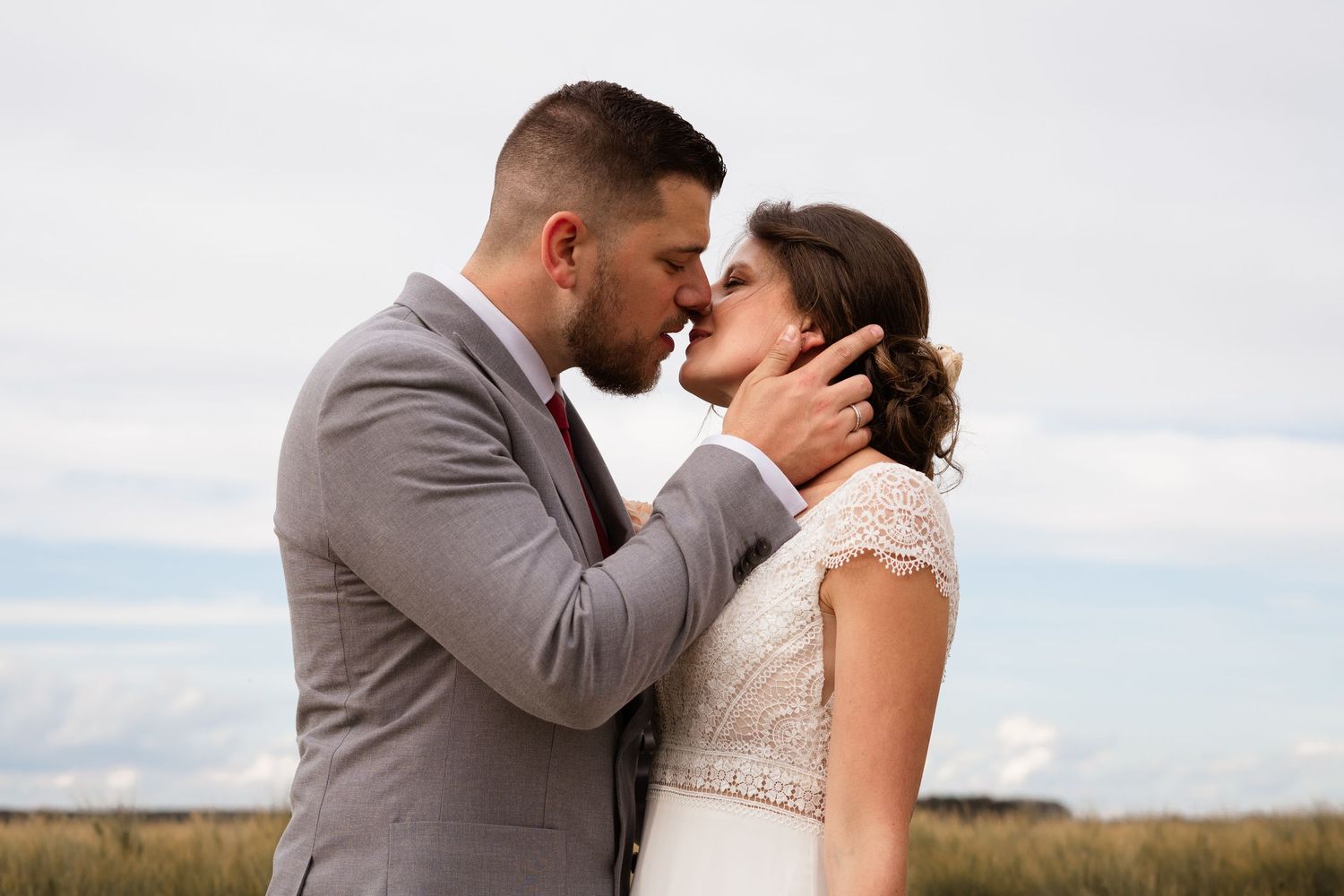 A romantic wedding moment captured in a lush garden setting.