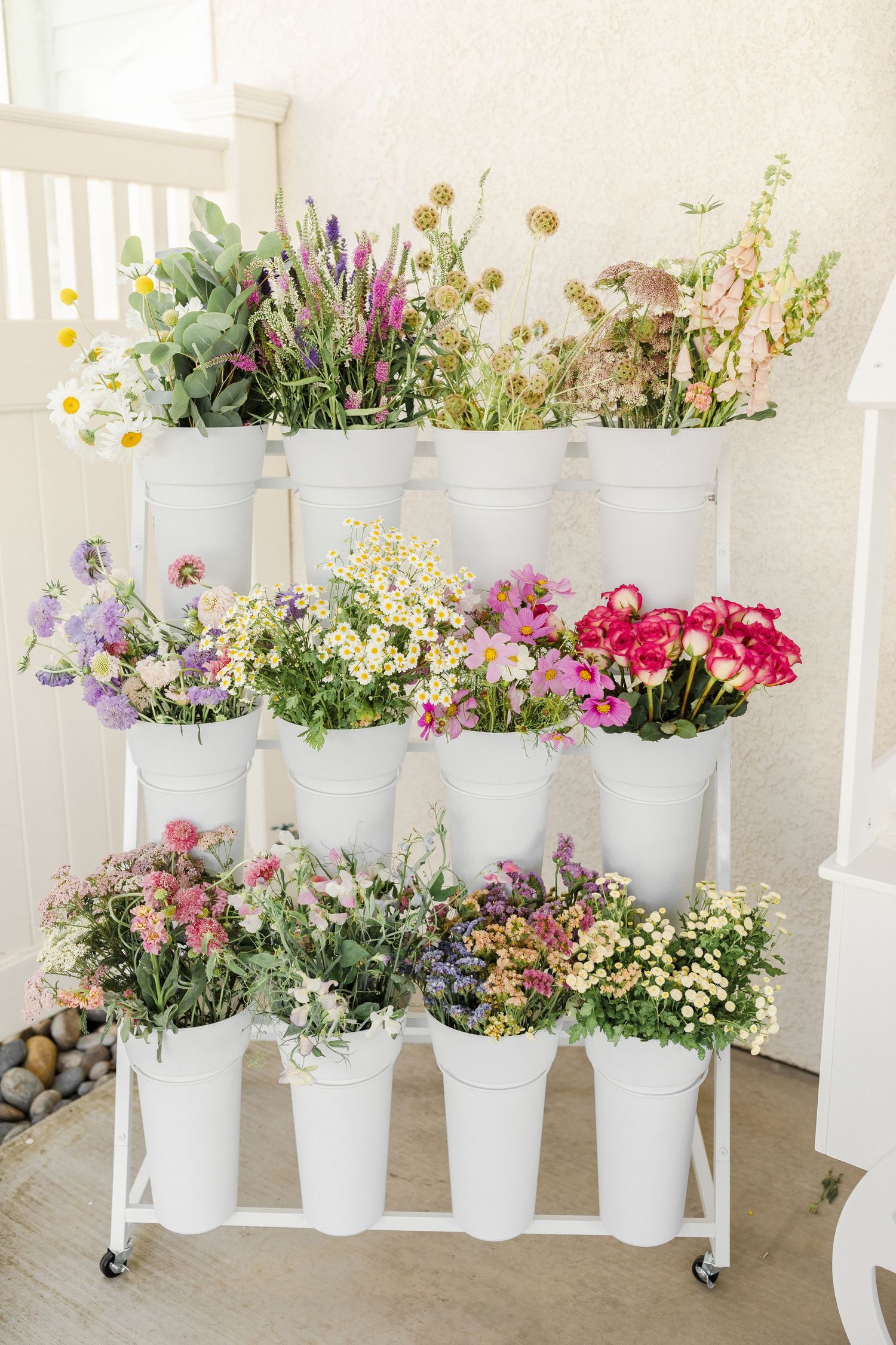Elegant floral arrangements and rustic furniture creates a romantic atmosphere by Artist's Oasis Garden for Chelsee Rawe Photography event