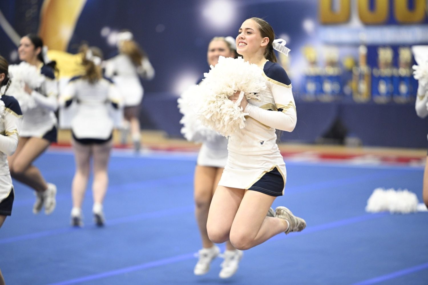 Competitive cheerleading routine photographed with the z6iii capturing mid air movement