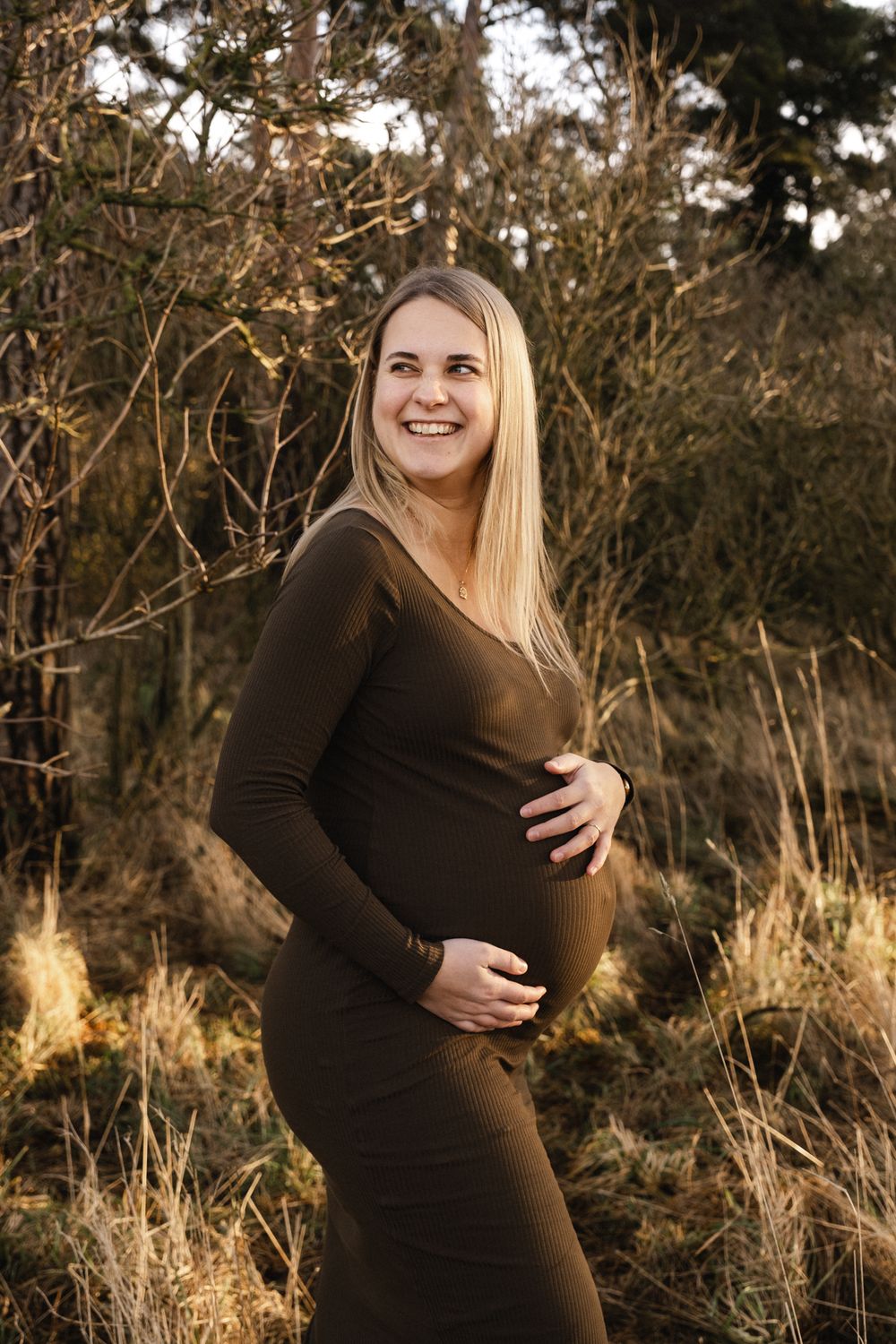 A series of maternity photos captured outdoors in a natural wooded setting during golden hour lighting.