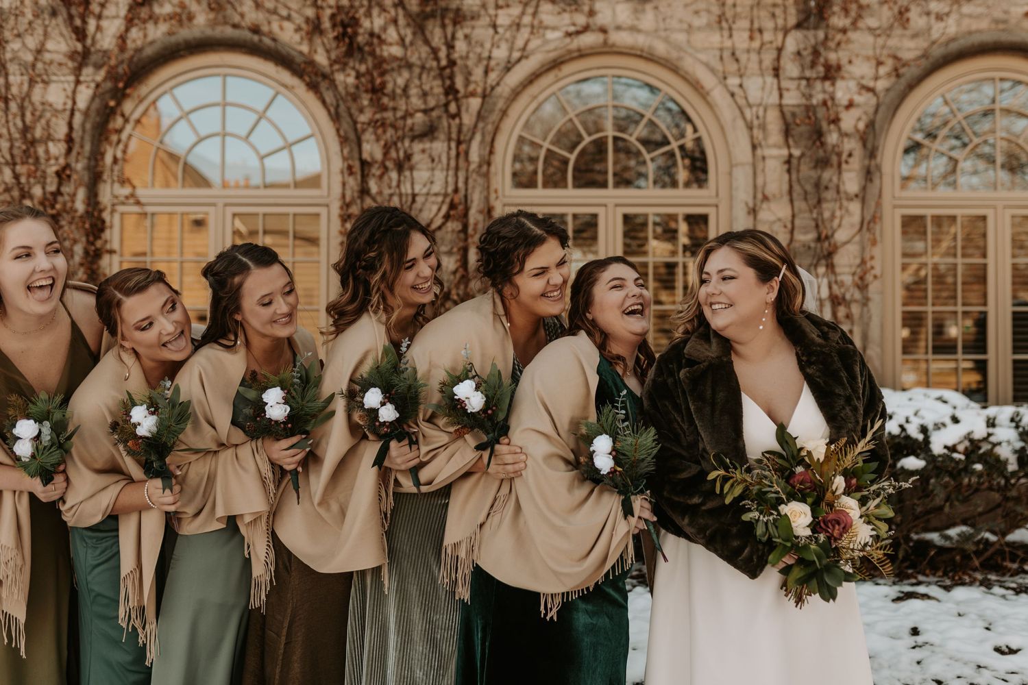 wedding party in front of Univeristy of Nebraska Campus sorority or faternity