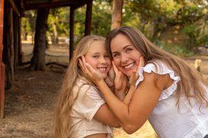 A series of outdoor photos showing joyful embraces and candid moments between people in a natural setting.family session eagle mountain park