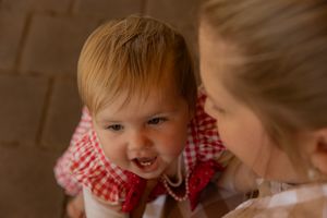 Looking down on baby girl for 1st birthday