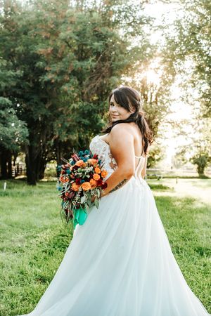 Bride in a Roselily Bridal gown