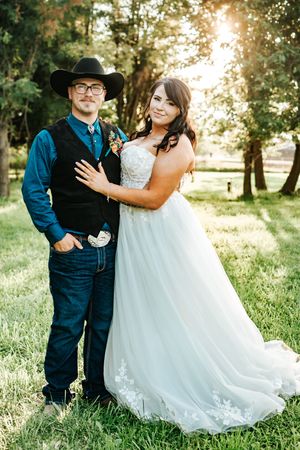 Bride and groom of a rustic outdoor wedding in eastern oregon.