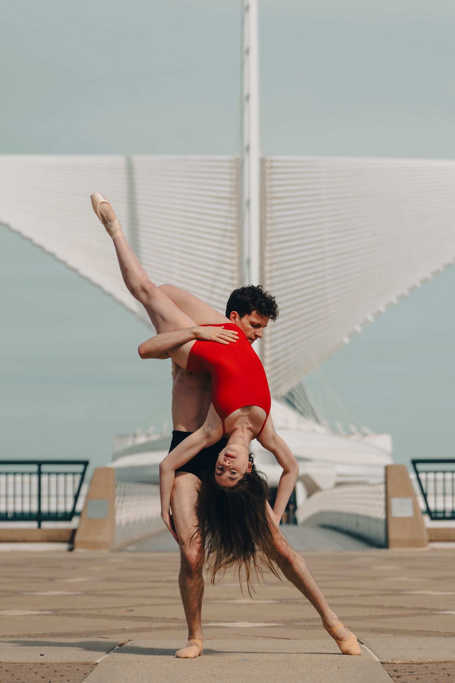 Milwaukee Ballet dance photography showcasing a classical pas de deux with dramatic lighting at the Milwaukee Art Museum