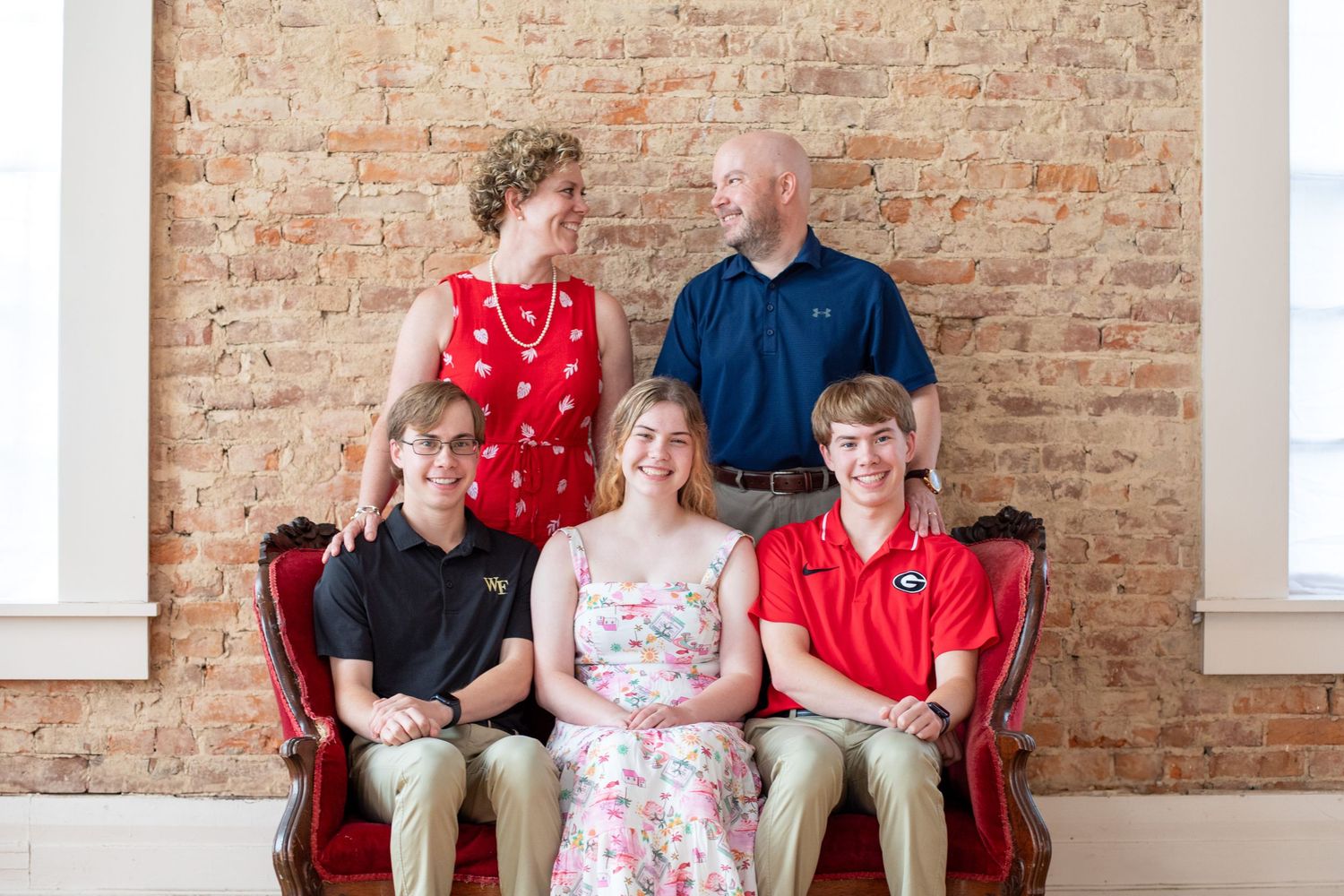Family studio session in Cincinnati with older children showcasing luxury, polished portraits for high-end clientele