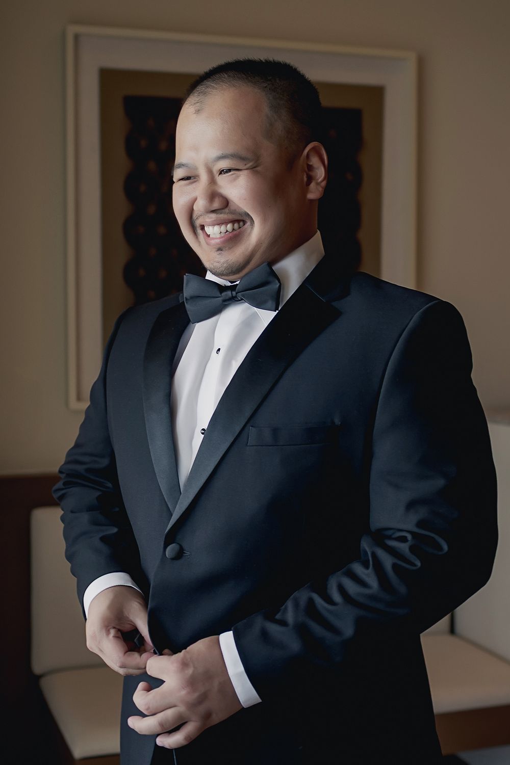 A series of five photo frames showing a person in a black tuxedo jacket and white dress shirt preparing for a formal event.