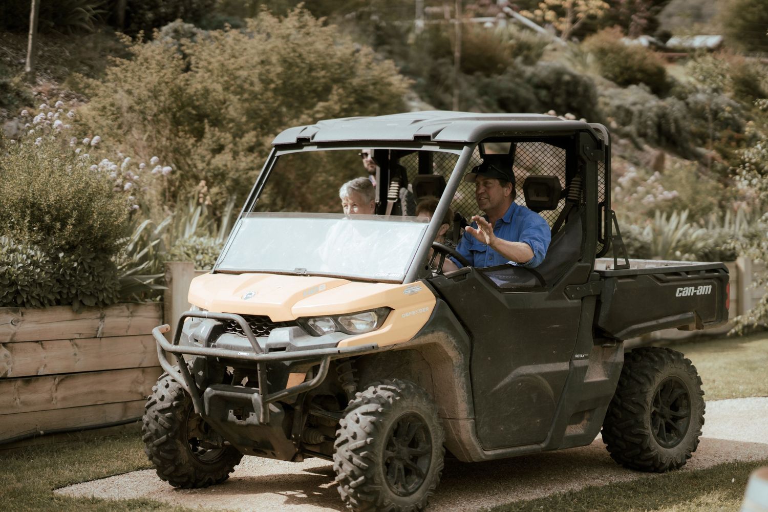 A sequence showing an off-road vehicle rolling over and crashing while climbing up a steep dirt embankment.