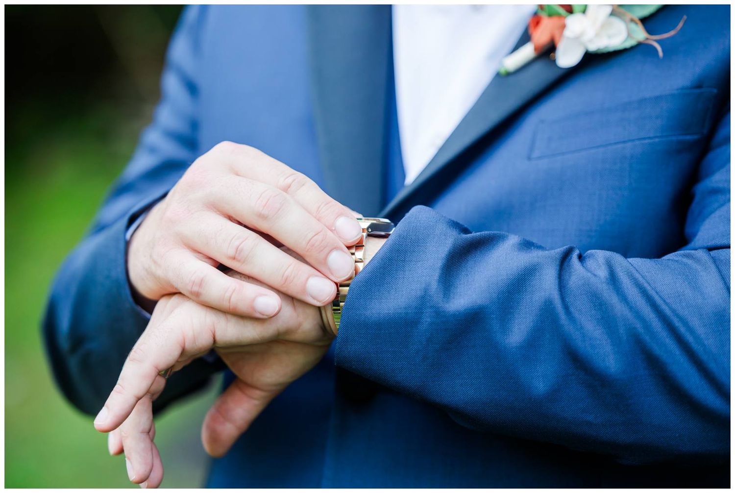 Close-up sequence showing hands sliding wedding bands onto fingers during a wedding ceremony.