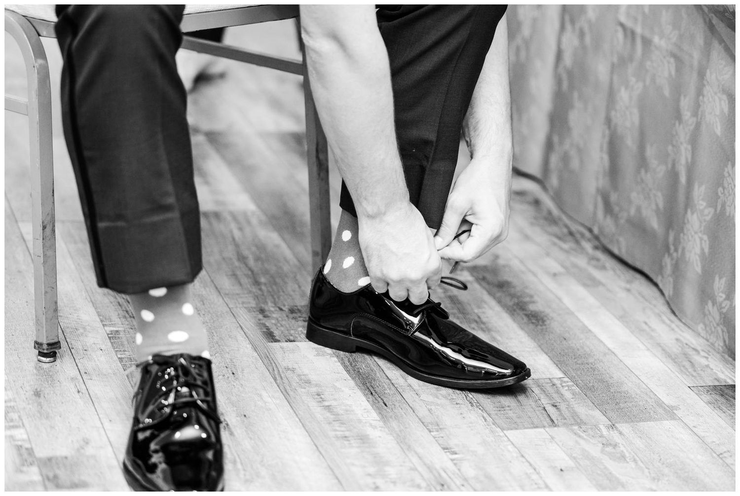 Wedding party shoes lined up in a row showing different formal footwear styles and colors against a light background.