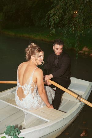 Series of intimate boat photos showing a couple in evening wedding attire rowing on still waters.