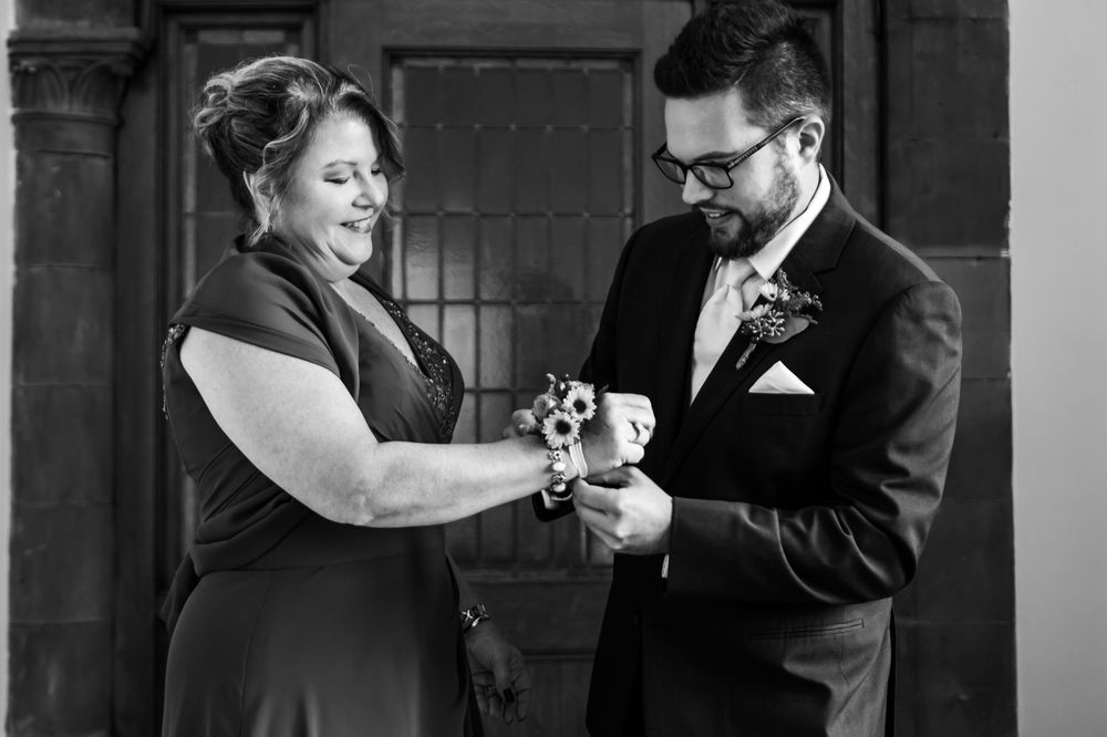 Black and white montage of a couple's wedding day showing multiple intimate moments during their celebration.