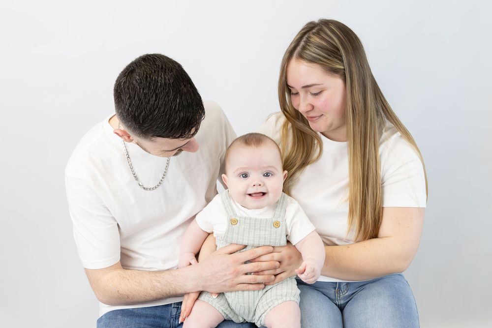 Parents in white shirts playing with their happy baby on a white background in a photo collage.