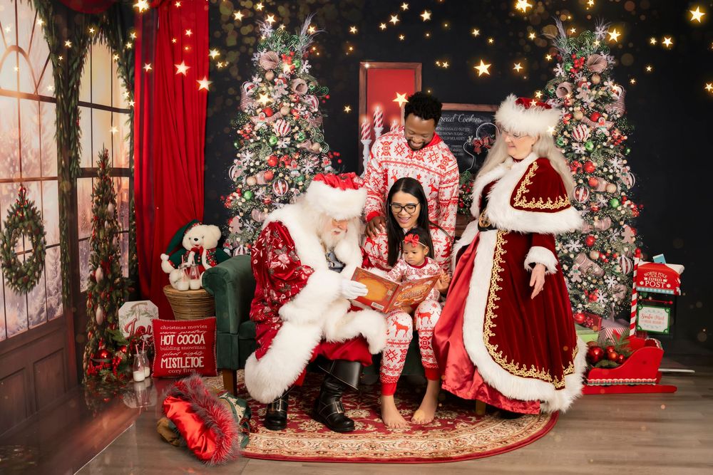 Festive Christmas mall display with red velvet chair, twinkling lights, and decorated trees creating a magical holiday scene.