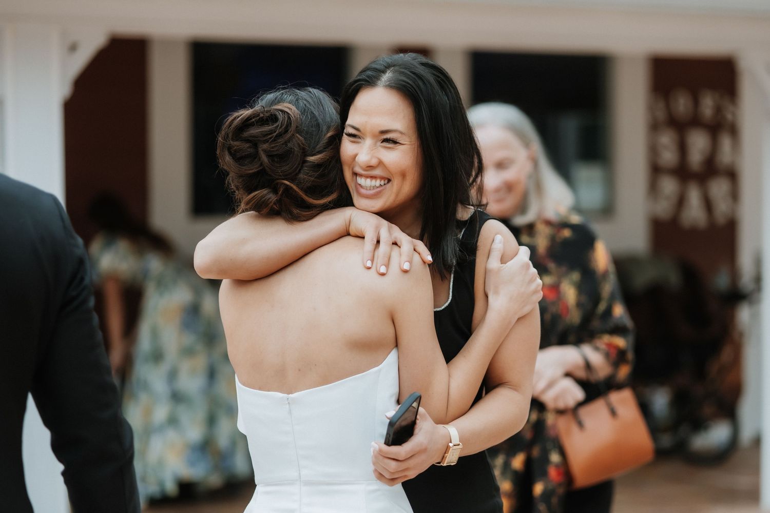 Intimate moments captured during an outdoor wedding celebration.