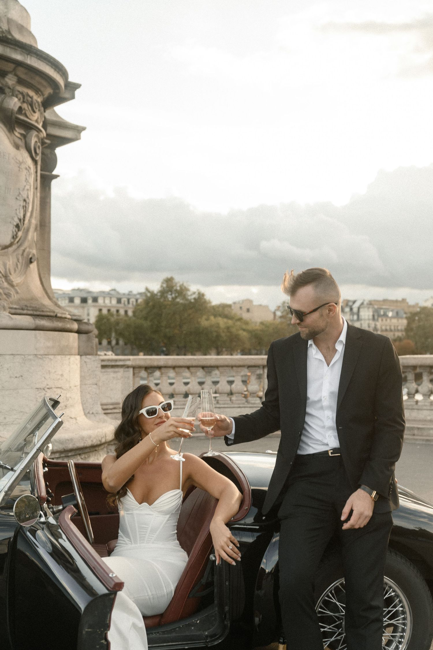 A romantic proposal moment overlooking a coastal mountain landscape with misty views of the Mediterranean Sea below.