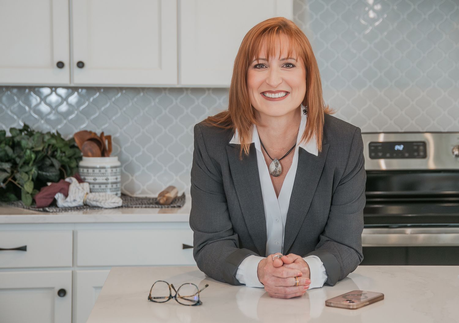 Authentic branding photo of a smiling entrepreneur, highlighting the power of real human faces in marketing visuals.
