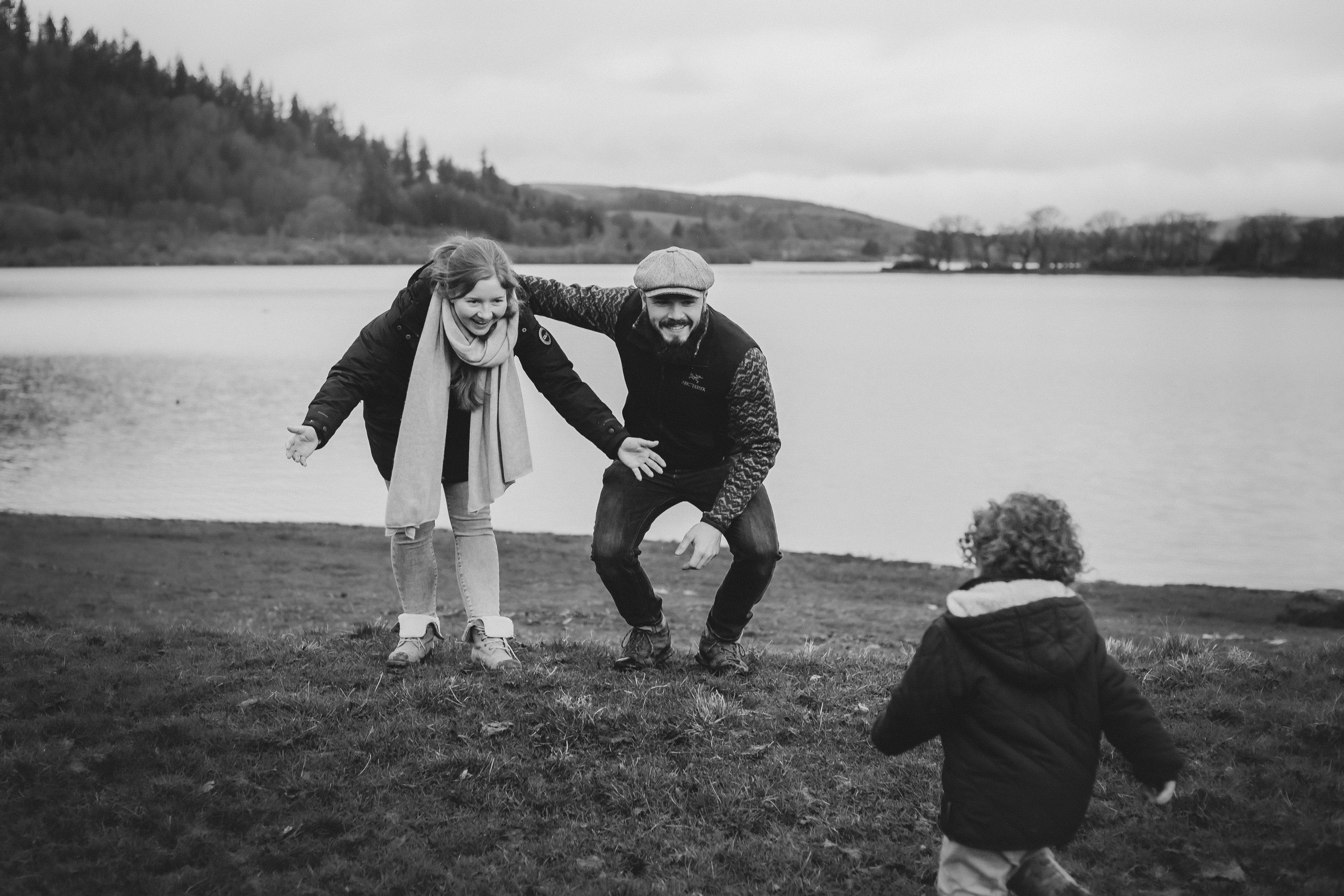 child running to mother and father natural, outdoor family photography