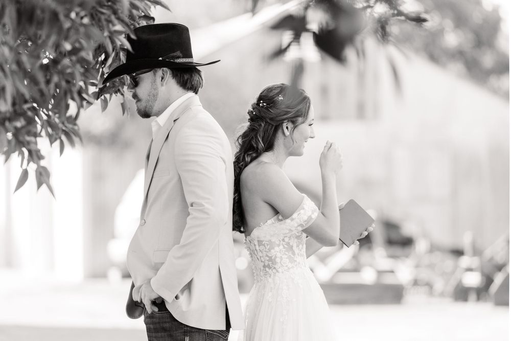 Soft black and white wedding portraits capturing tender moments between a couple.
