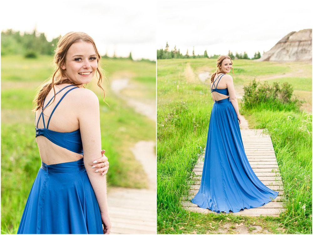Two-piece royal blue dress with cutout back detail and flowing skirt in outdoor setting.