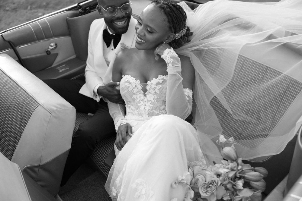Black and white candid moments from a wedding celebration showing joy and laughter.