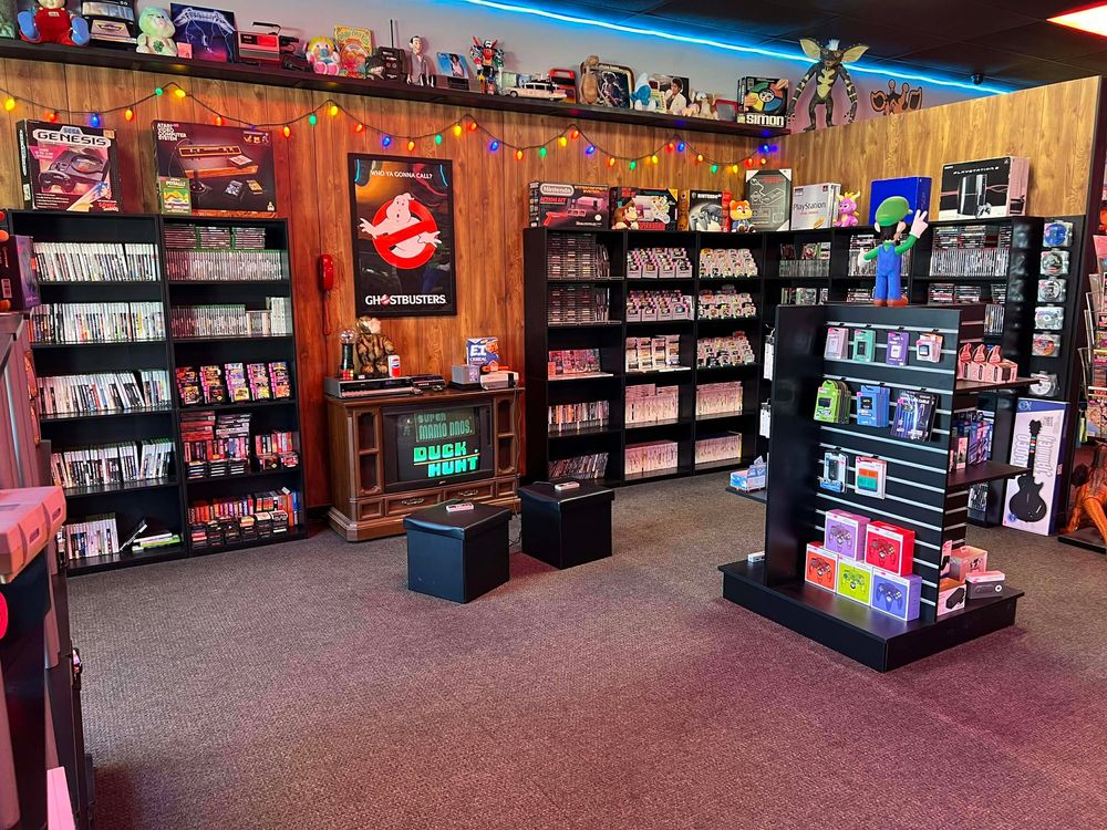 Panoramic view of a vintage toy store interior with shelves full of collectibles and memorabilia.